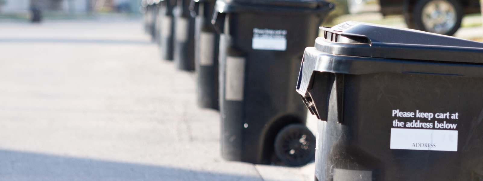 A parking meter on the side of a street.