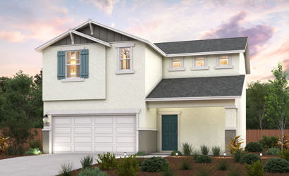 A white house with a garage.