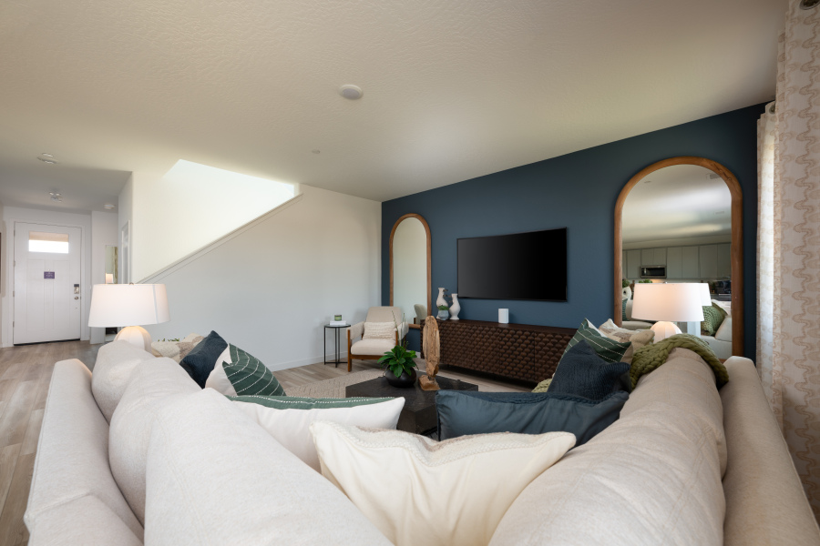 A living room with a large tv.