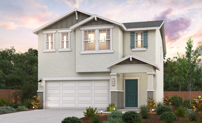 A white house with a garage.