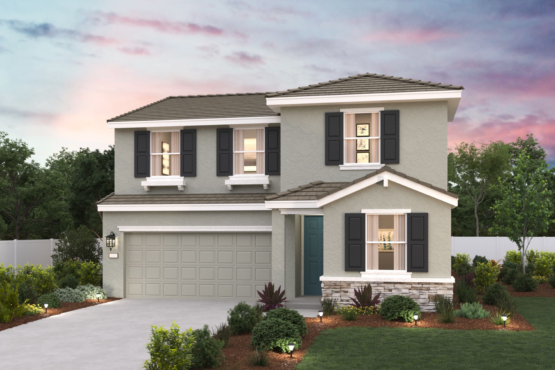 A white house with a garage.