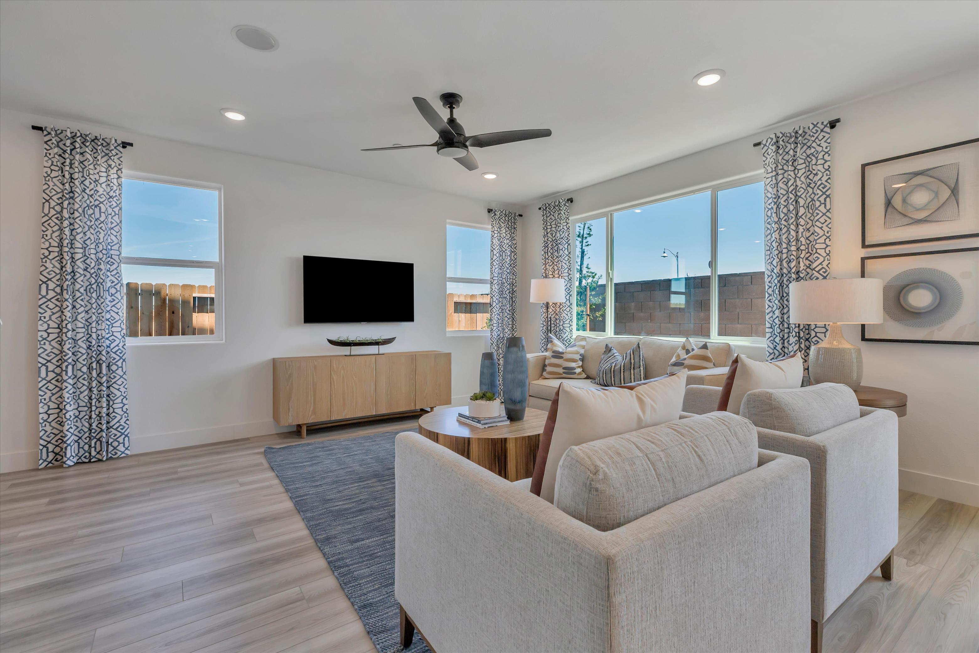 A living room with a large window.