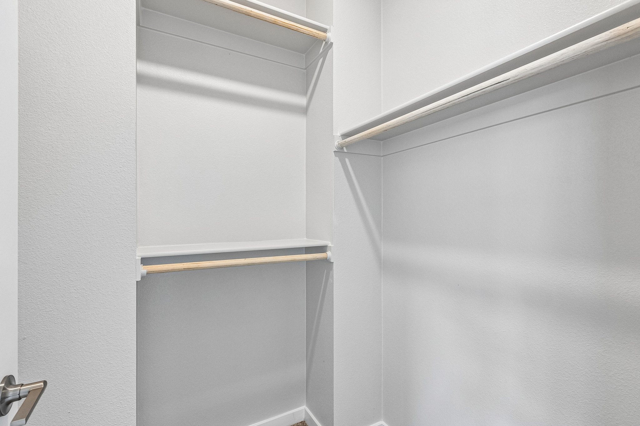 A white door with a metal frame.