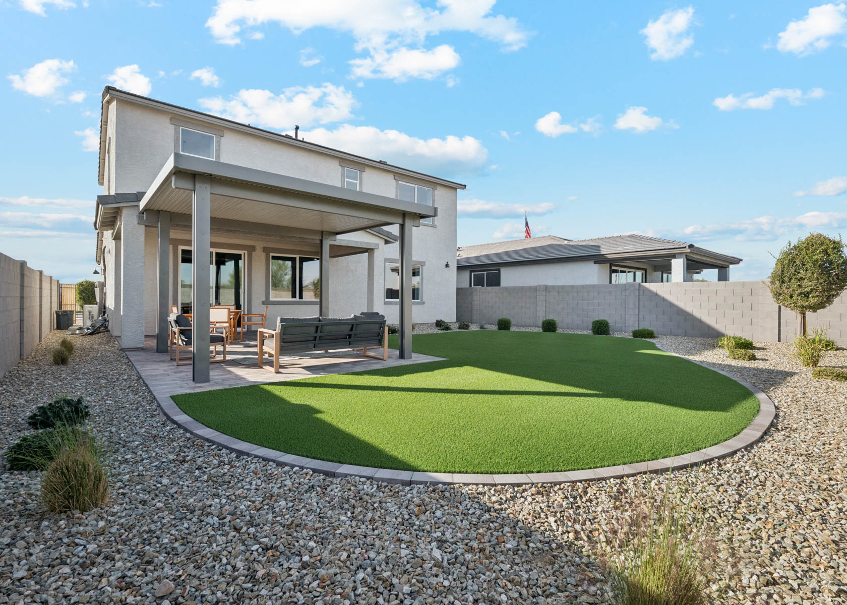 A building with a large lawn.
