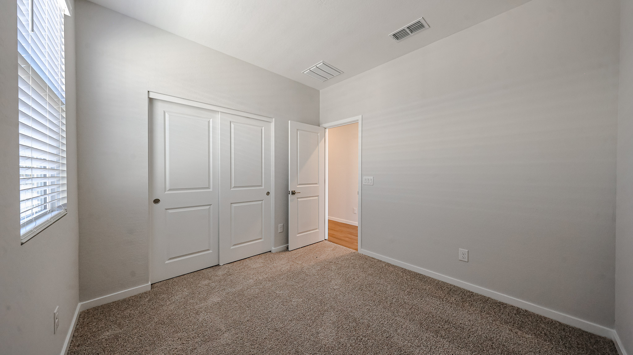 A room with white doors.