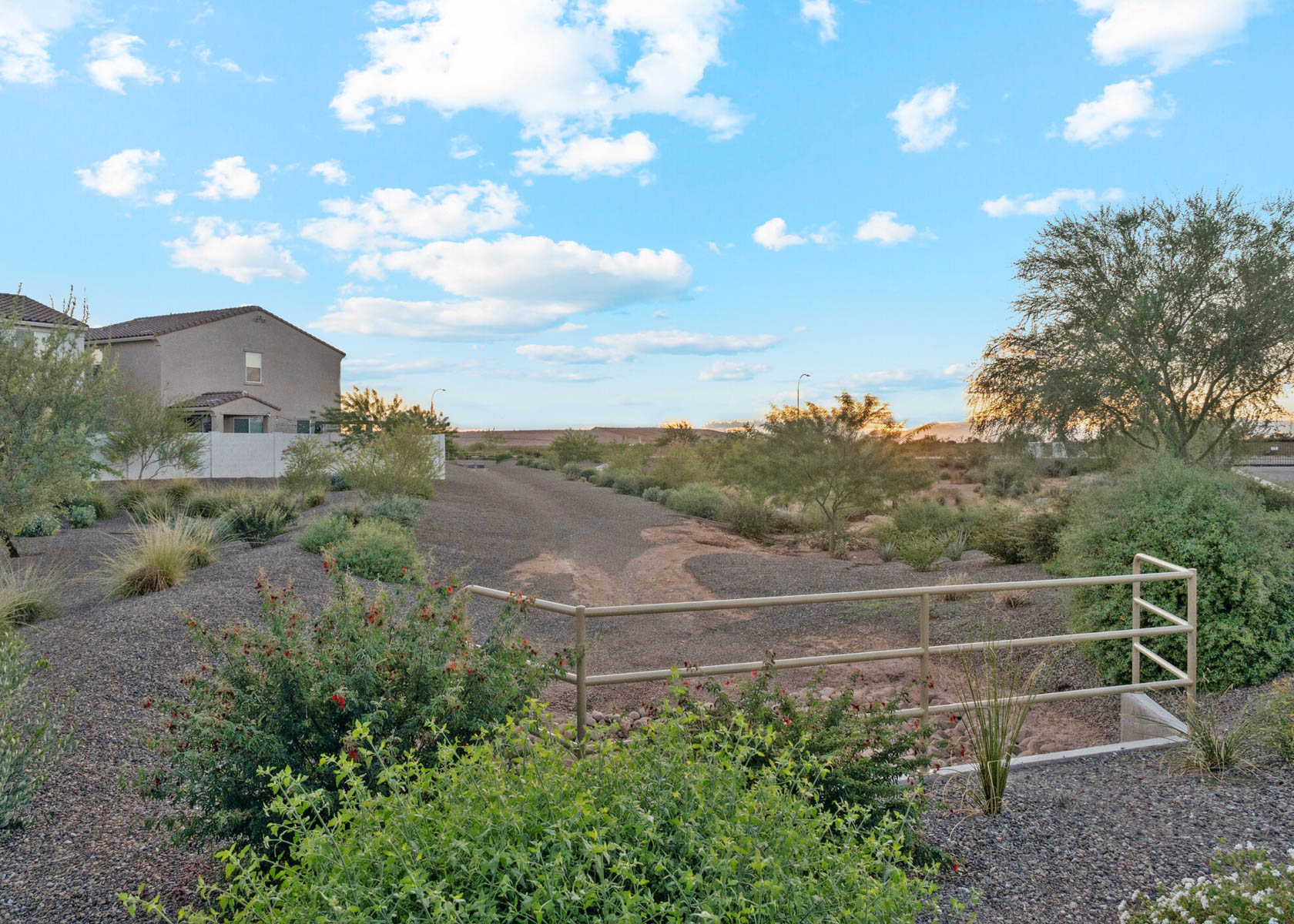 A garden with a fence.
