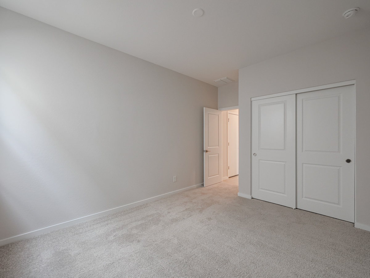 A room with white doors.