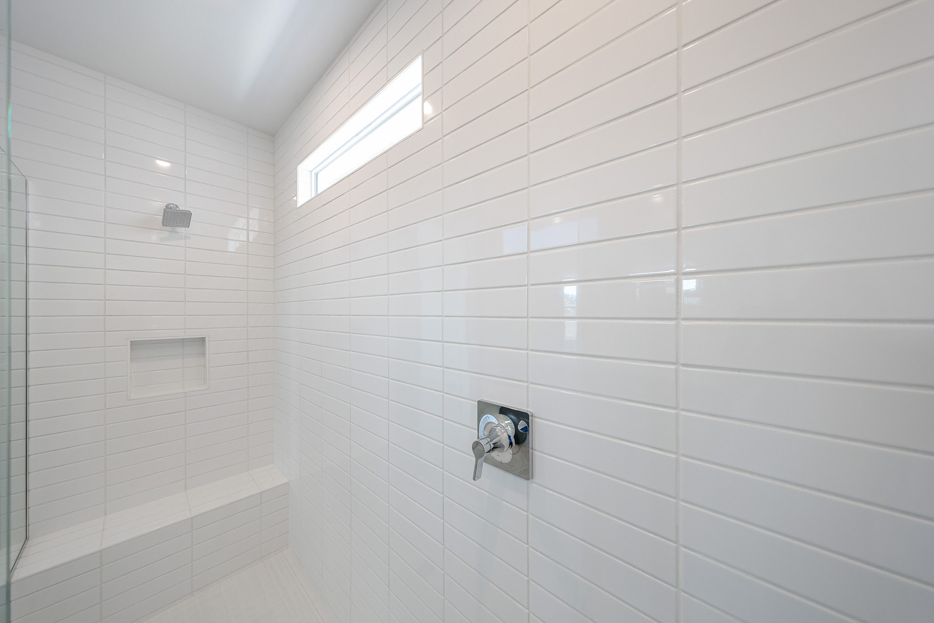 A white tiled wall.