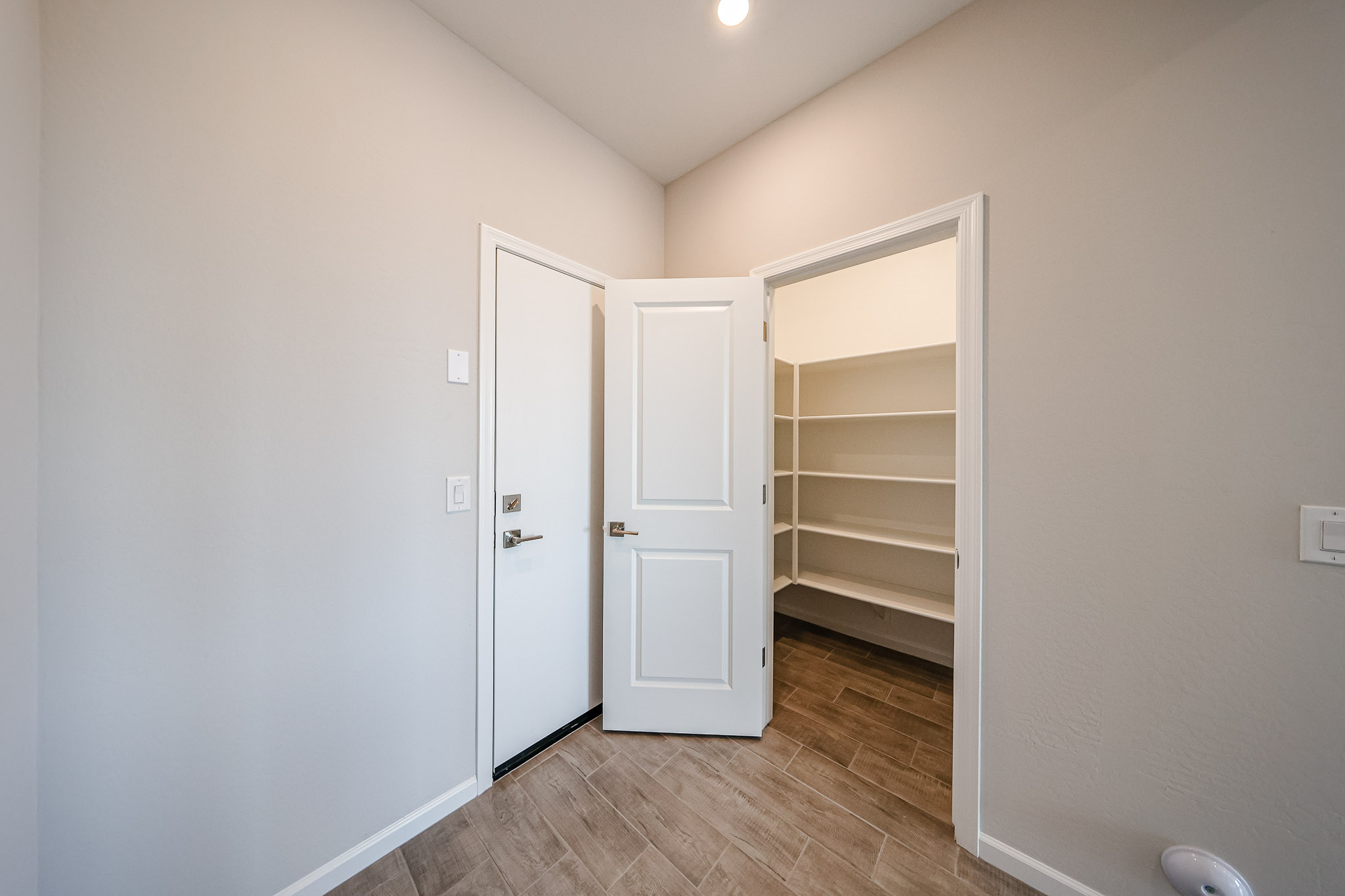 A room with white doors.