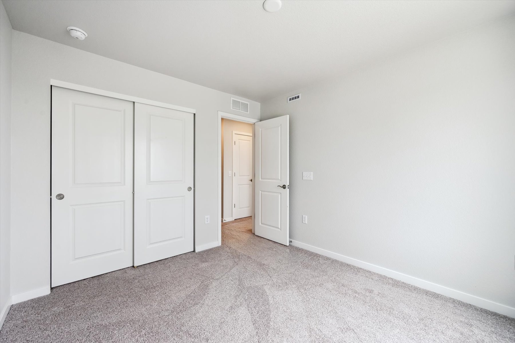 A room with white doors.