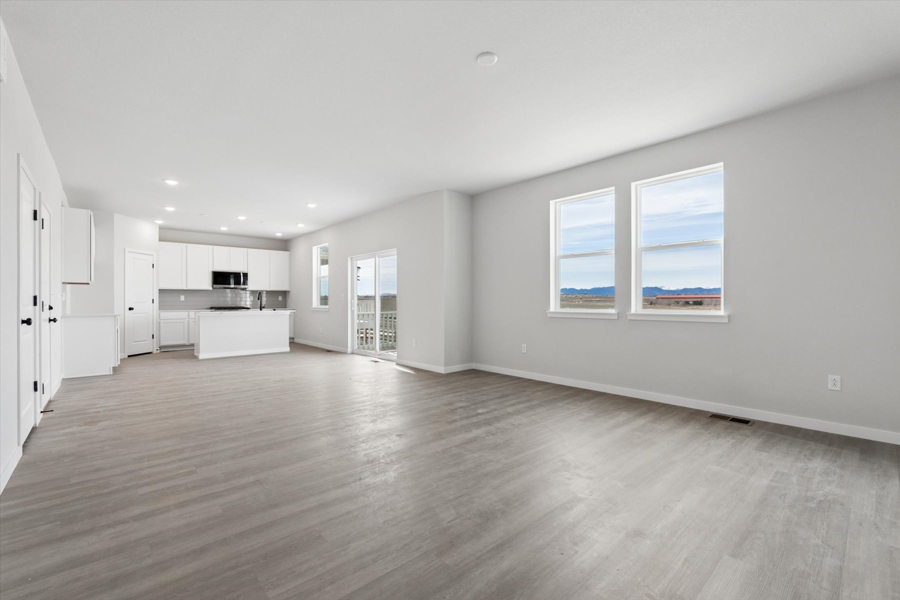 A large empty room with white walls.