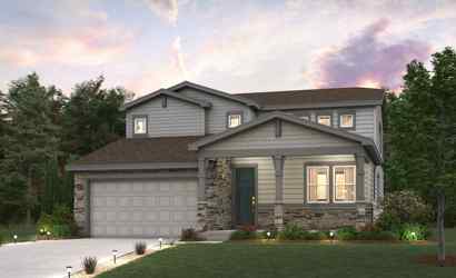 A house with a garage and trees.