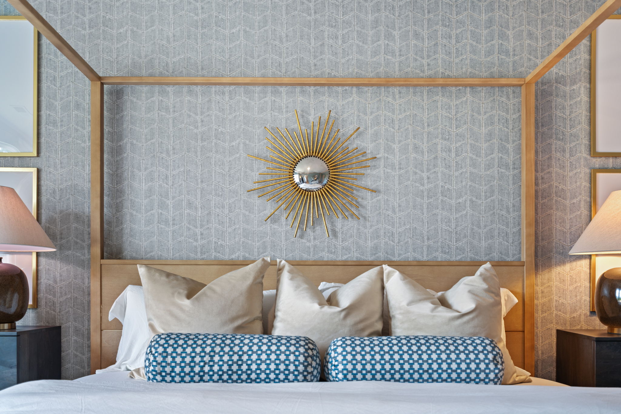 A bed with a fan on it.