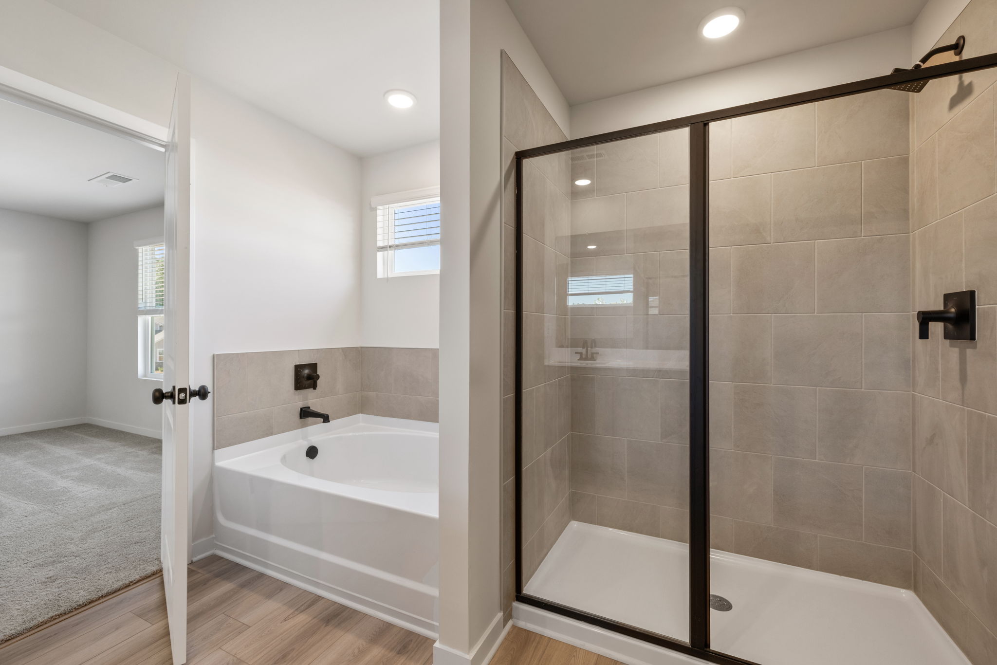 A bathroom with a glass shower.