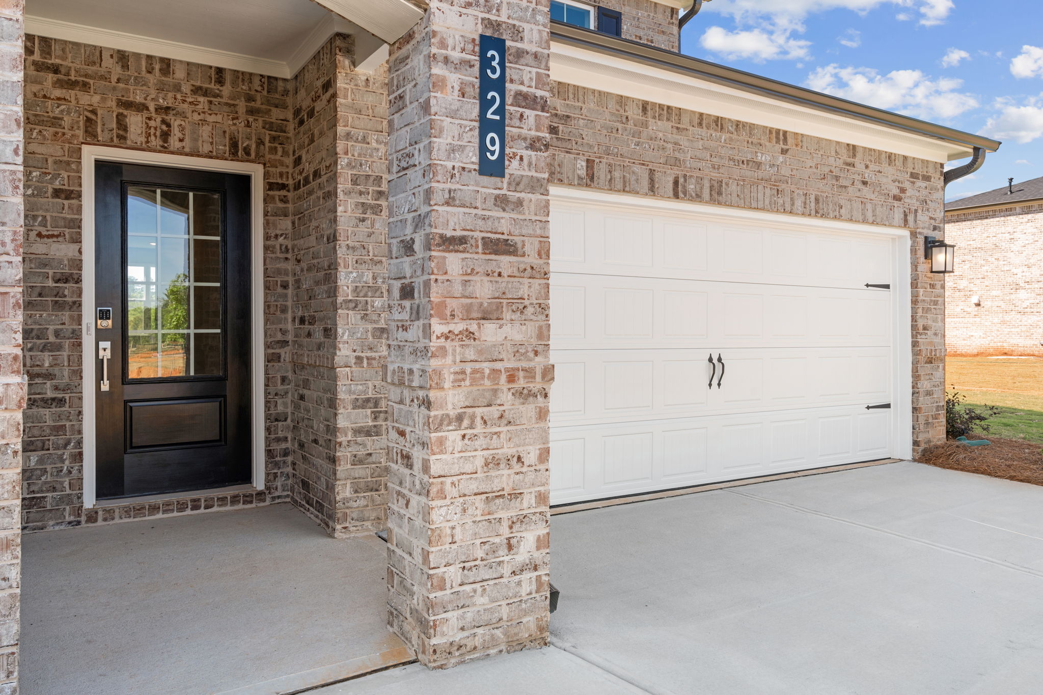 A garage door and a garage.