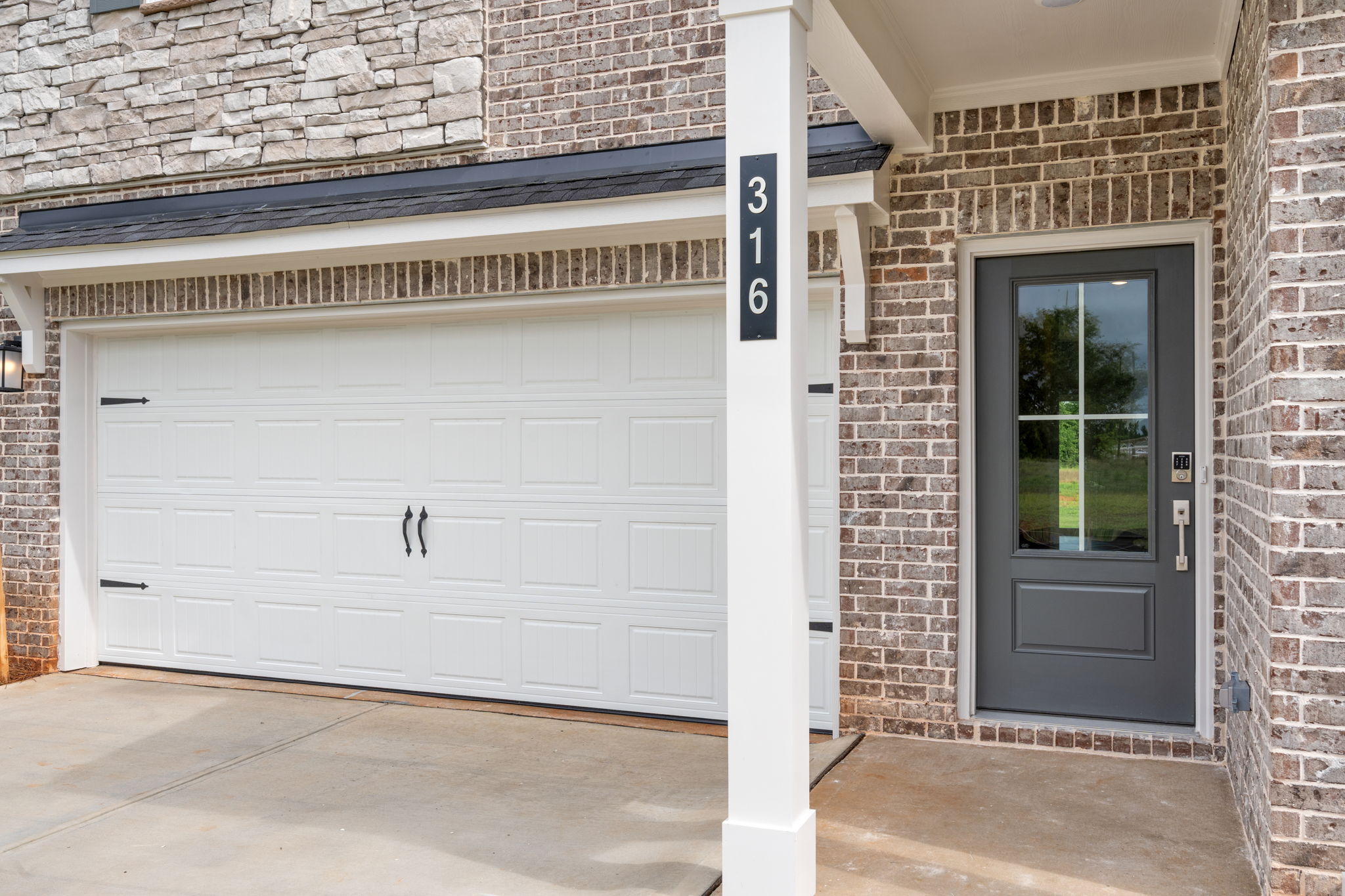 A garage door and a white garage door.