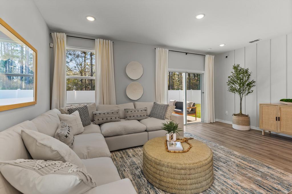 A living room with a large window.