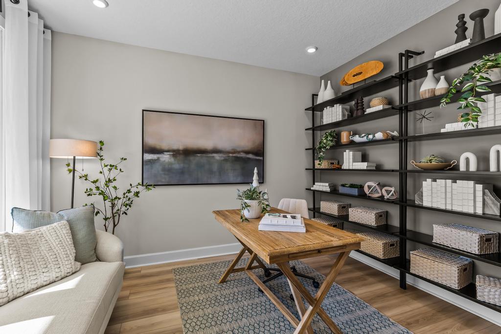 A room with a table and shelves.