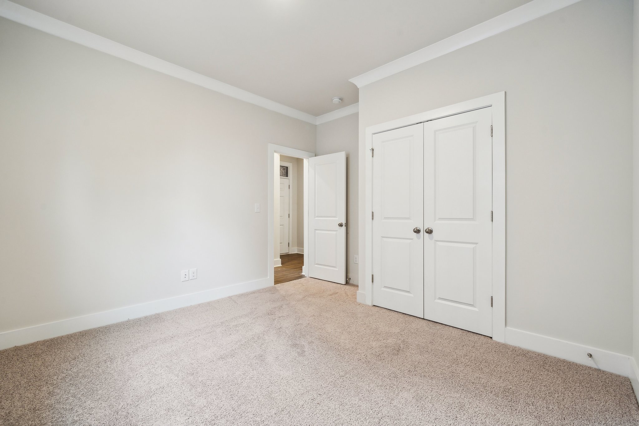 A room with white doors.