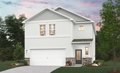 A white house with a garage.