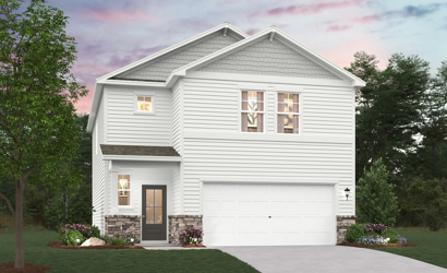 A white house with a garage.