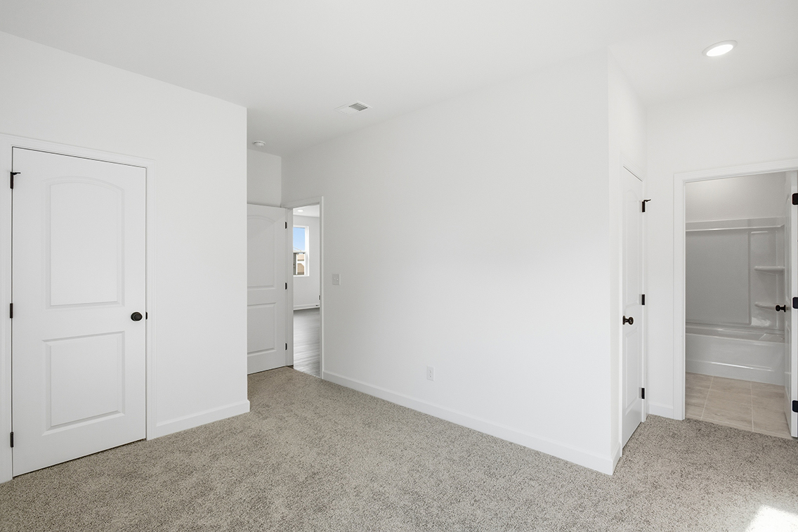 A room with white doors.