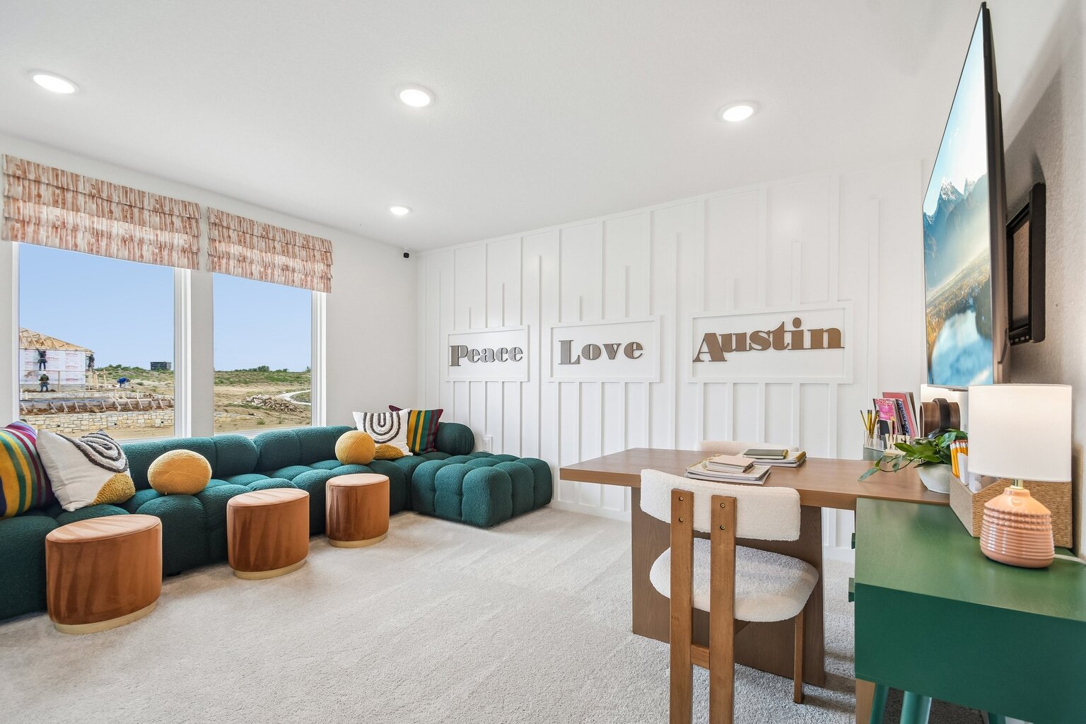 A room with a table and chairs.