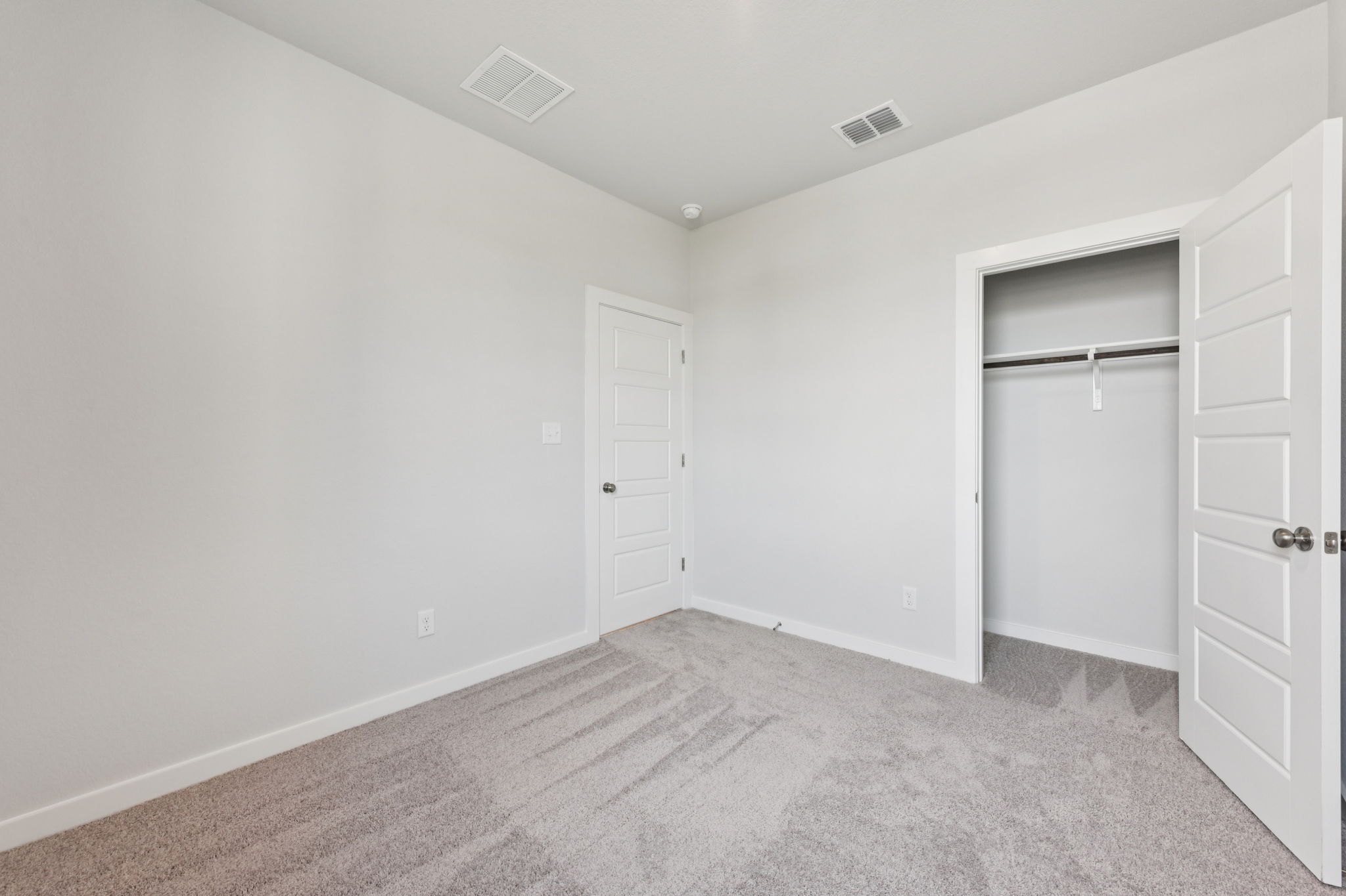 A room with white doors.