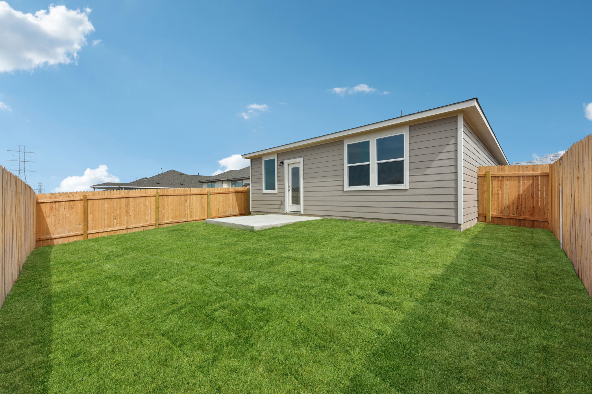 A house with a fence around it.