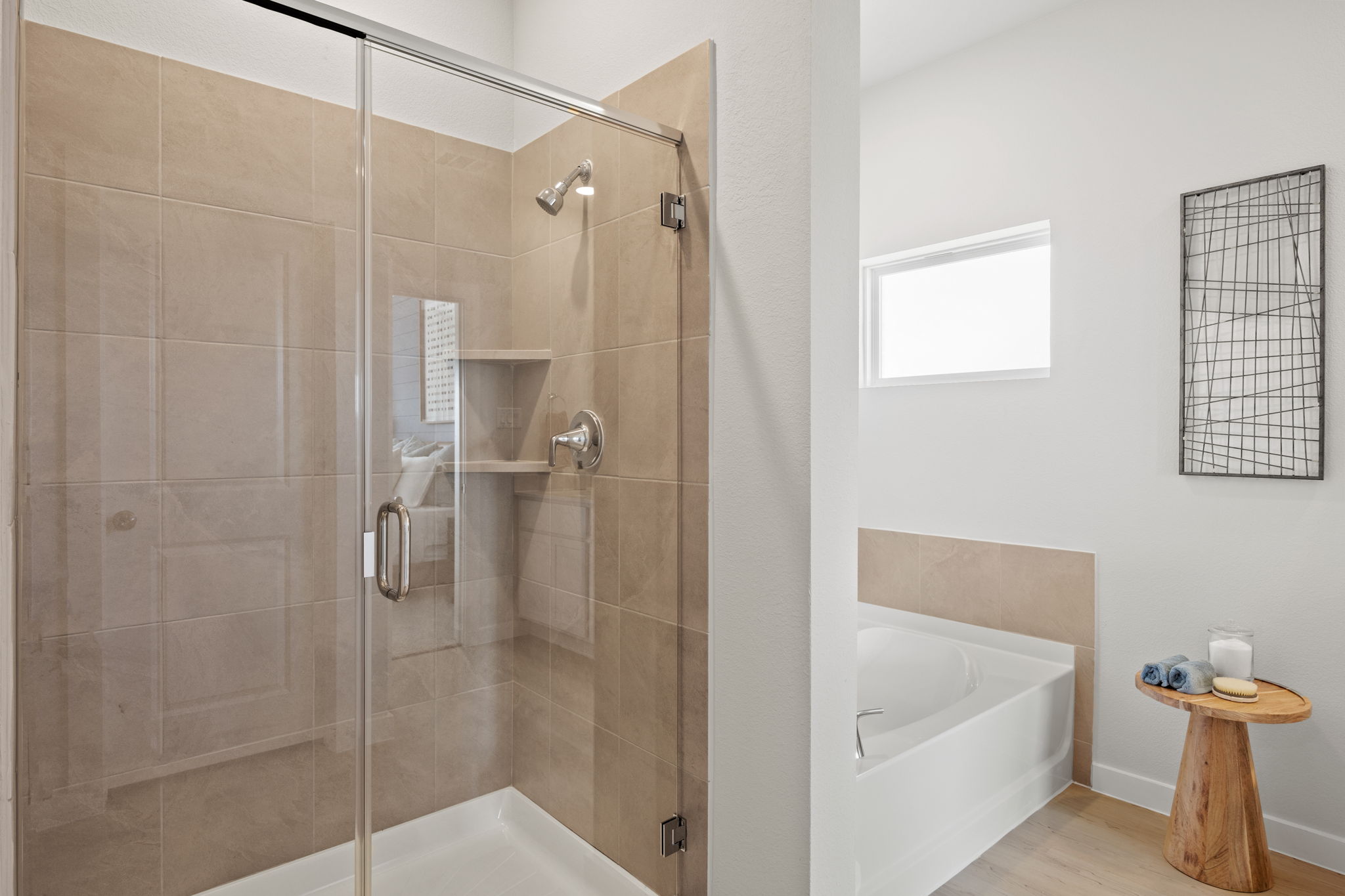 A bathroom with a glass shower.