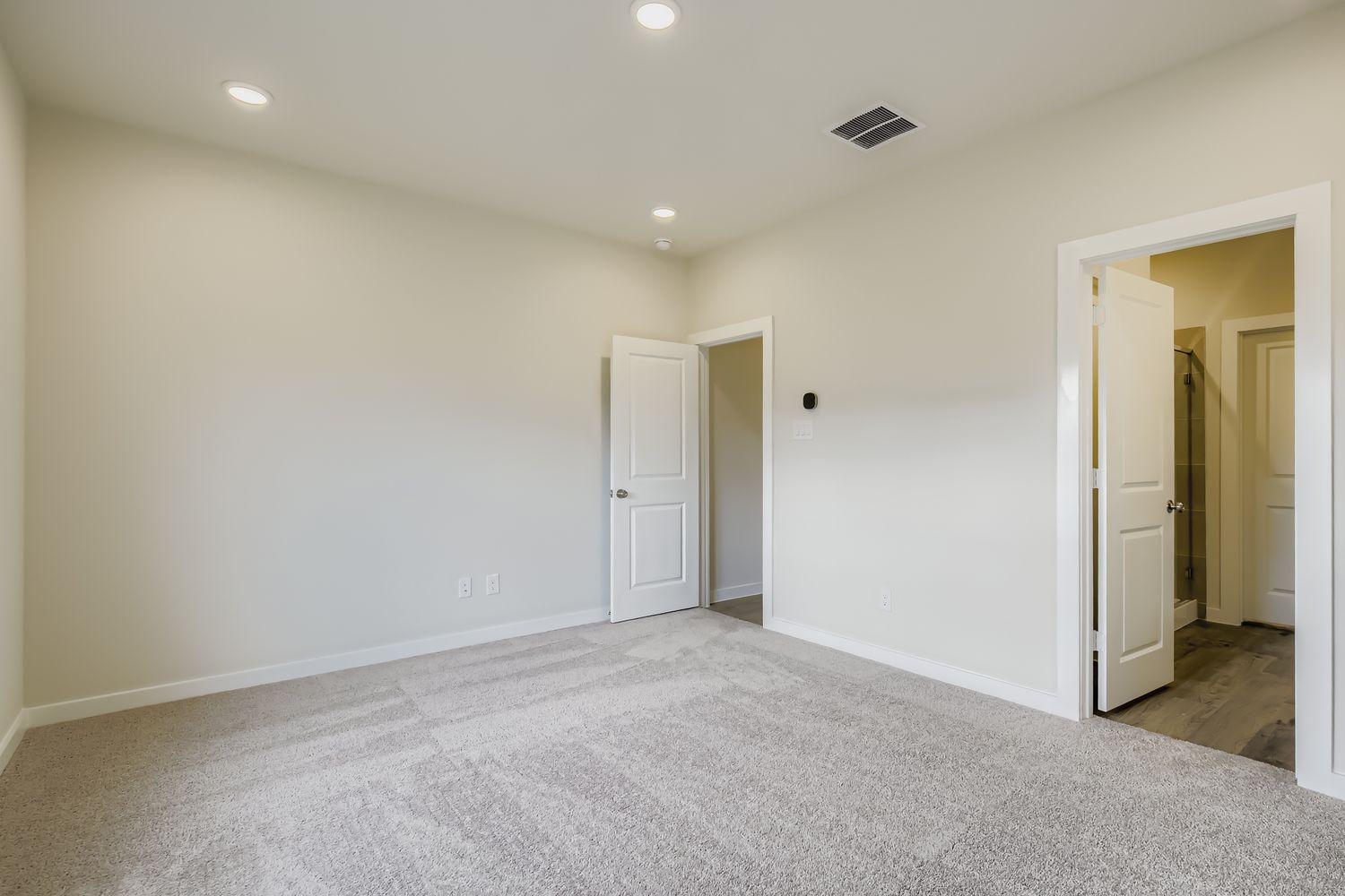 A room with white doors.