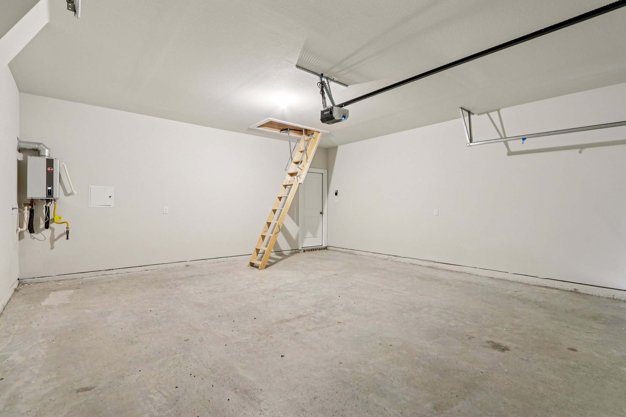 A room with a ladder and a ladder.