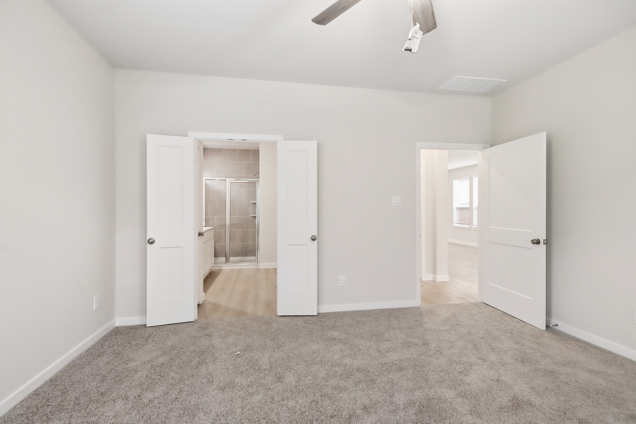 A room with white doors.