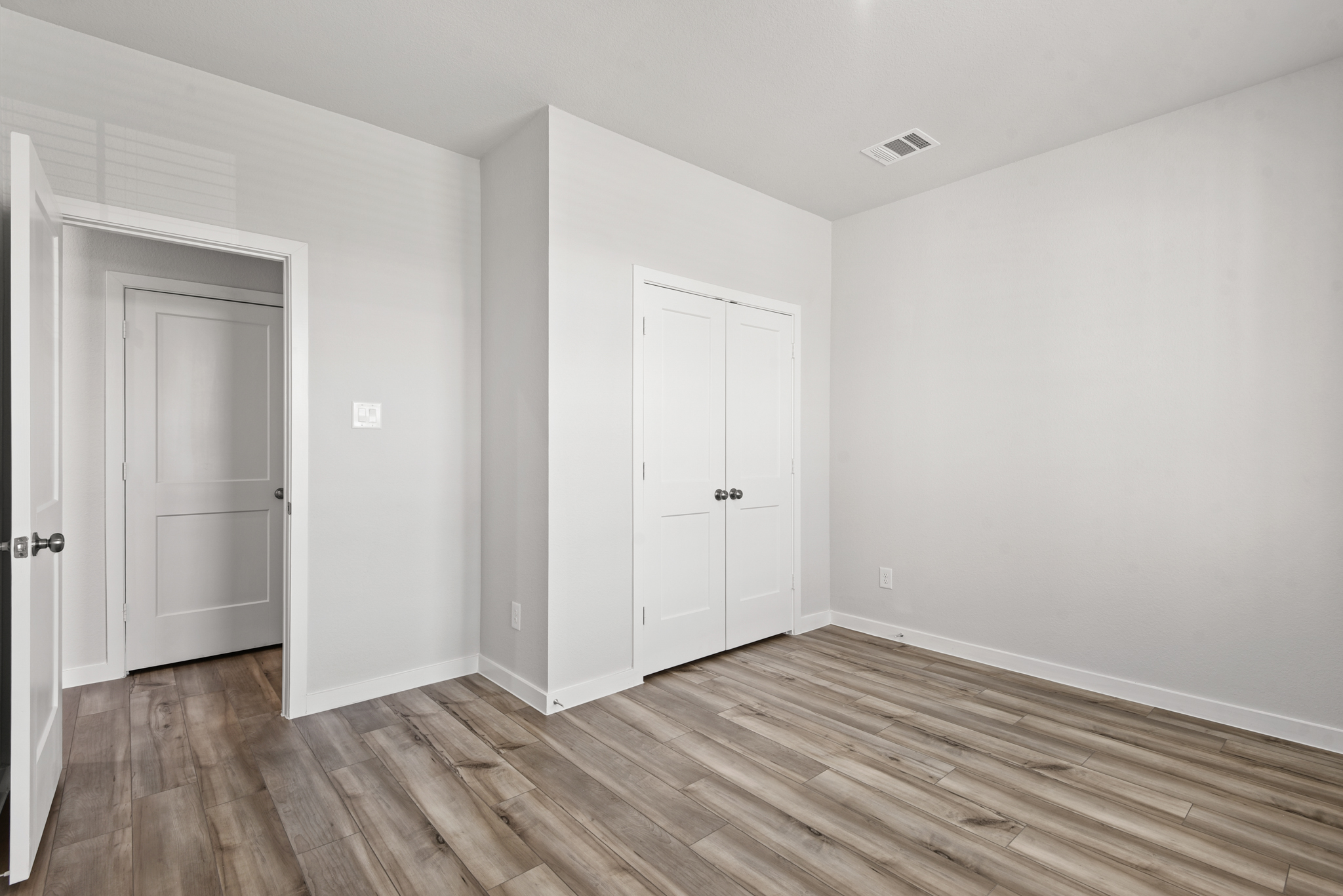 A room with white doors.