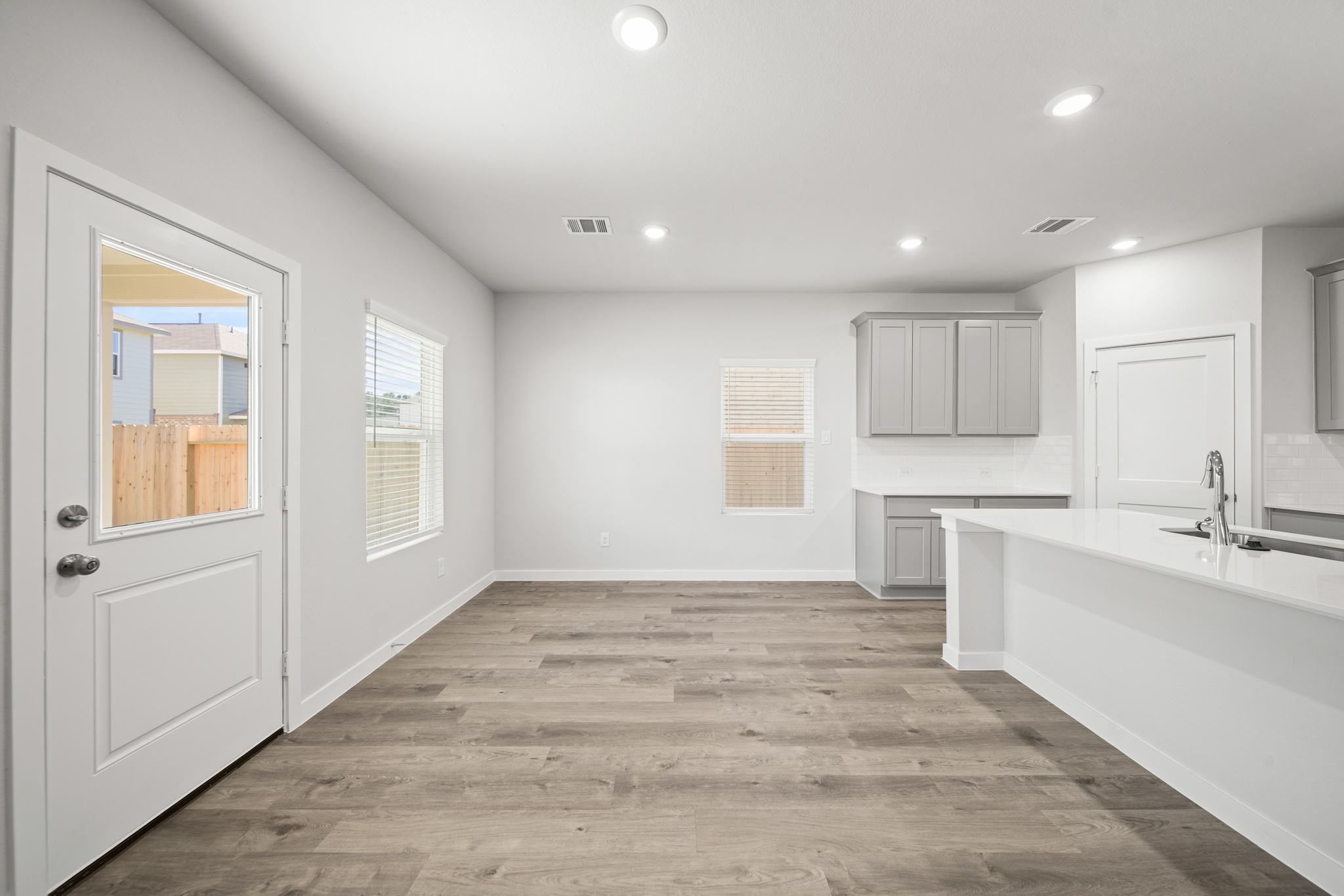 A bathroom with a tub and sink.