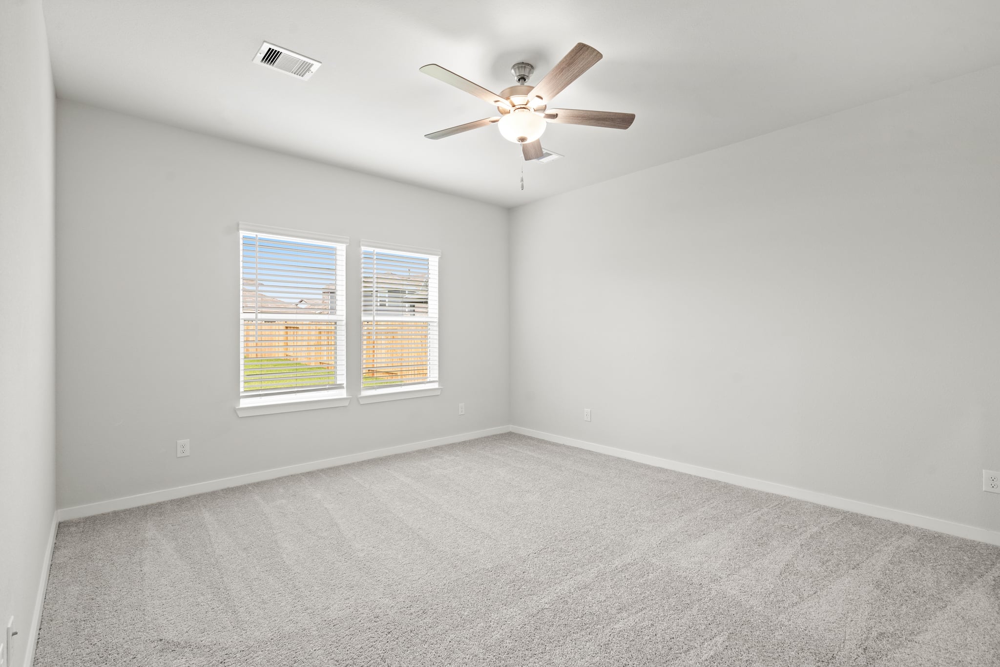 A ceiling fan in a room.