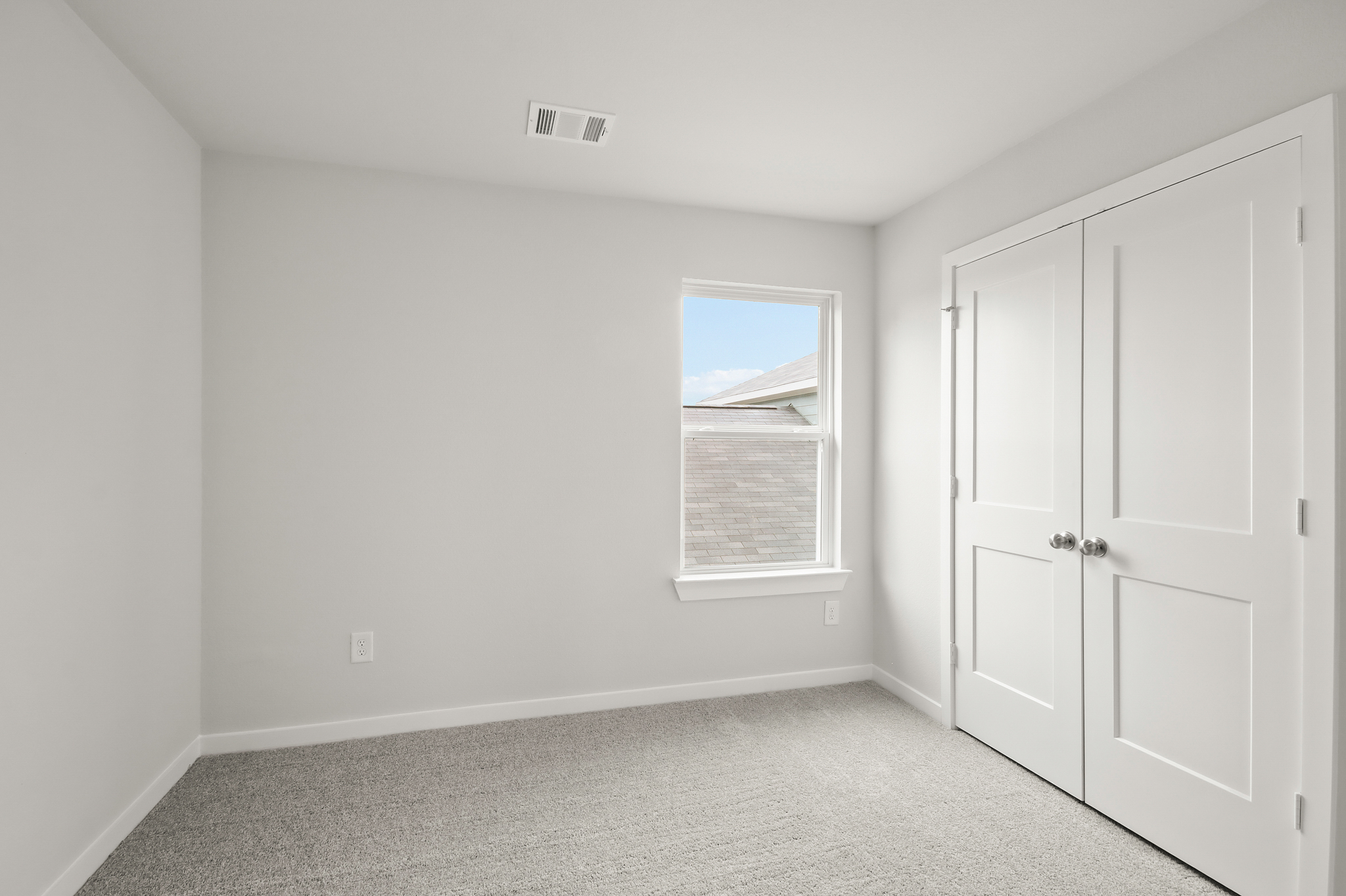 A room with white doors.