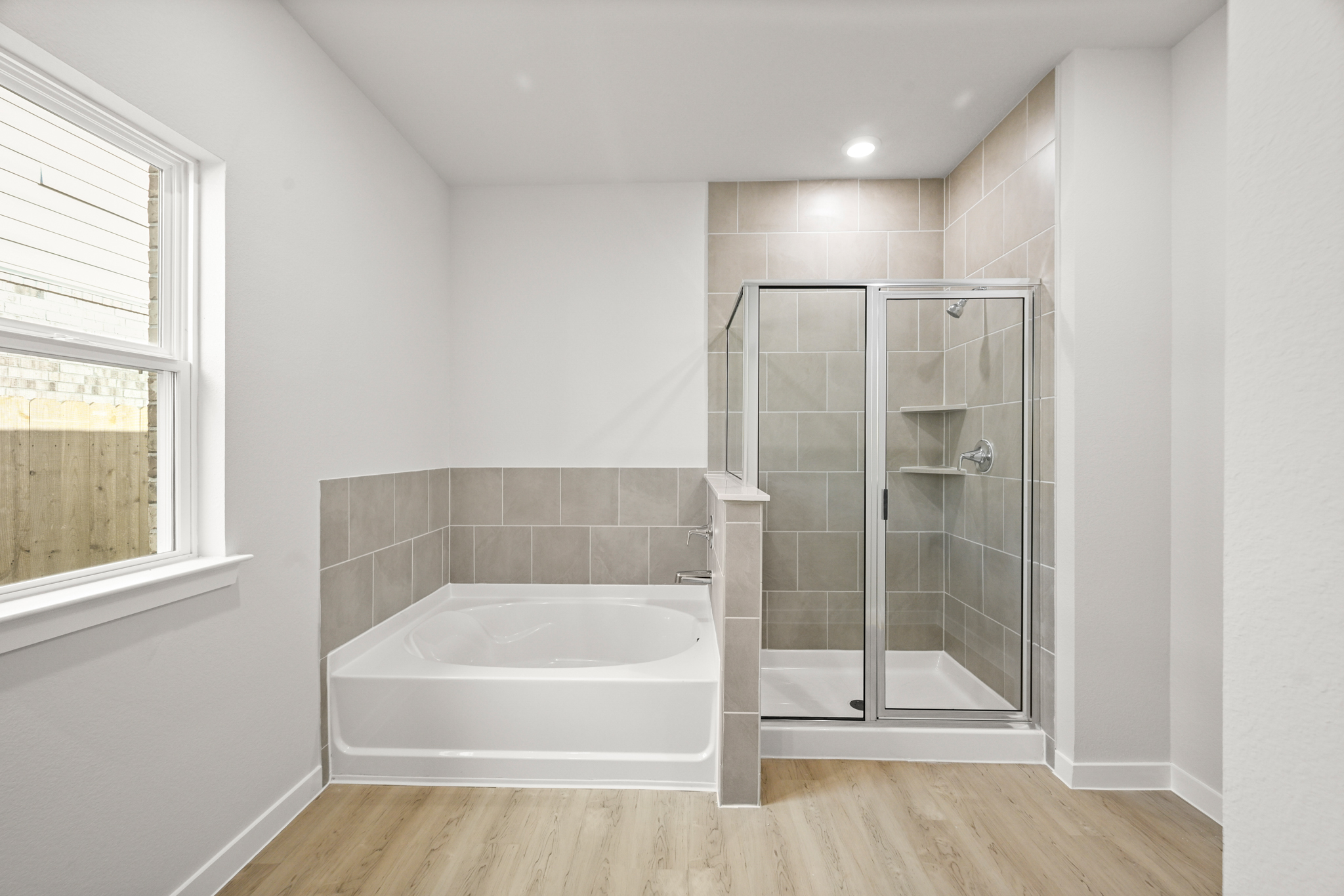 A bathroom with a glass shower.