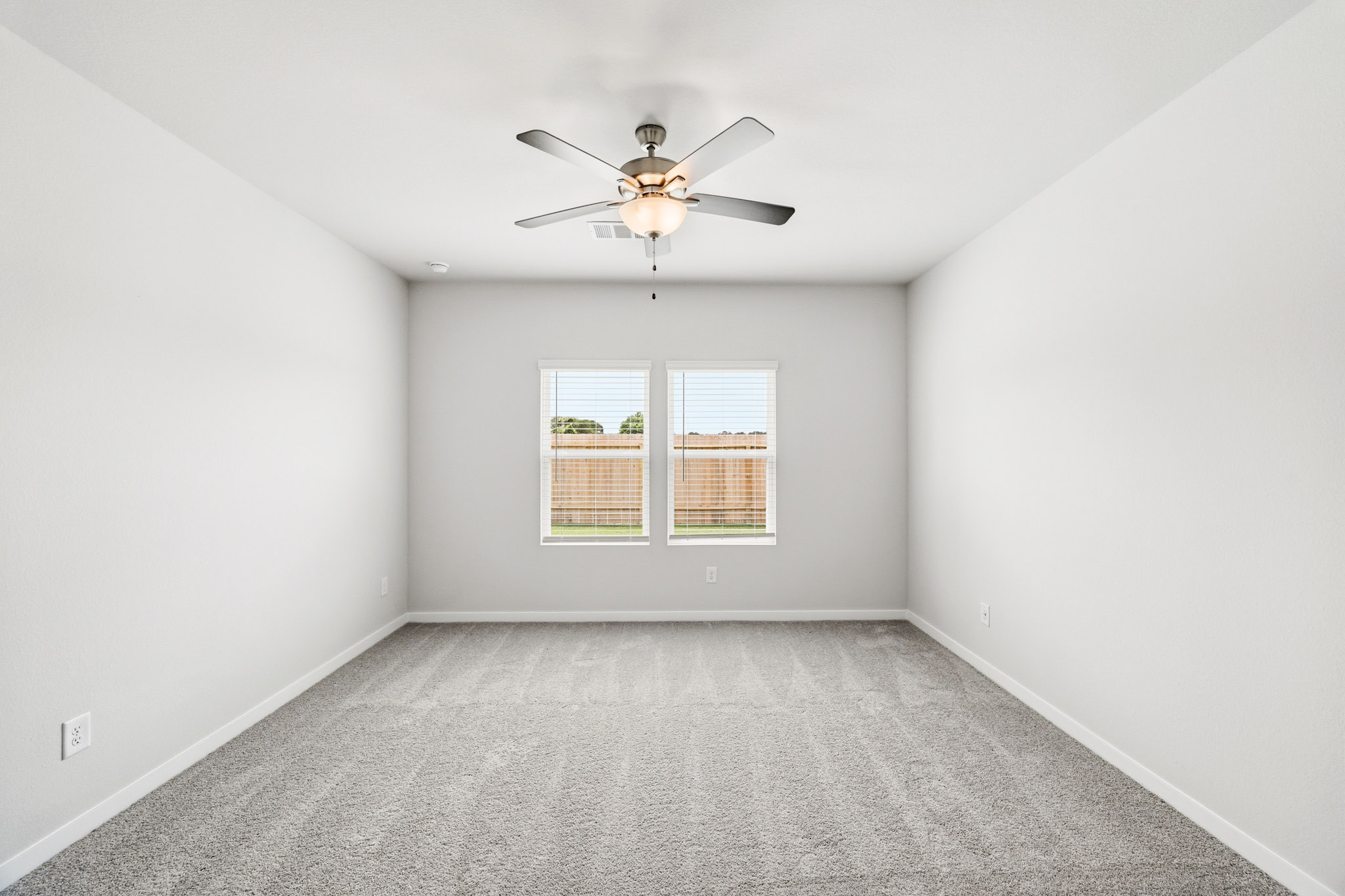 A ceiling fan in a room.