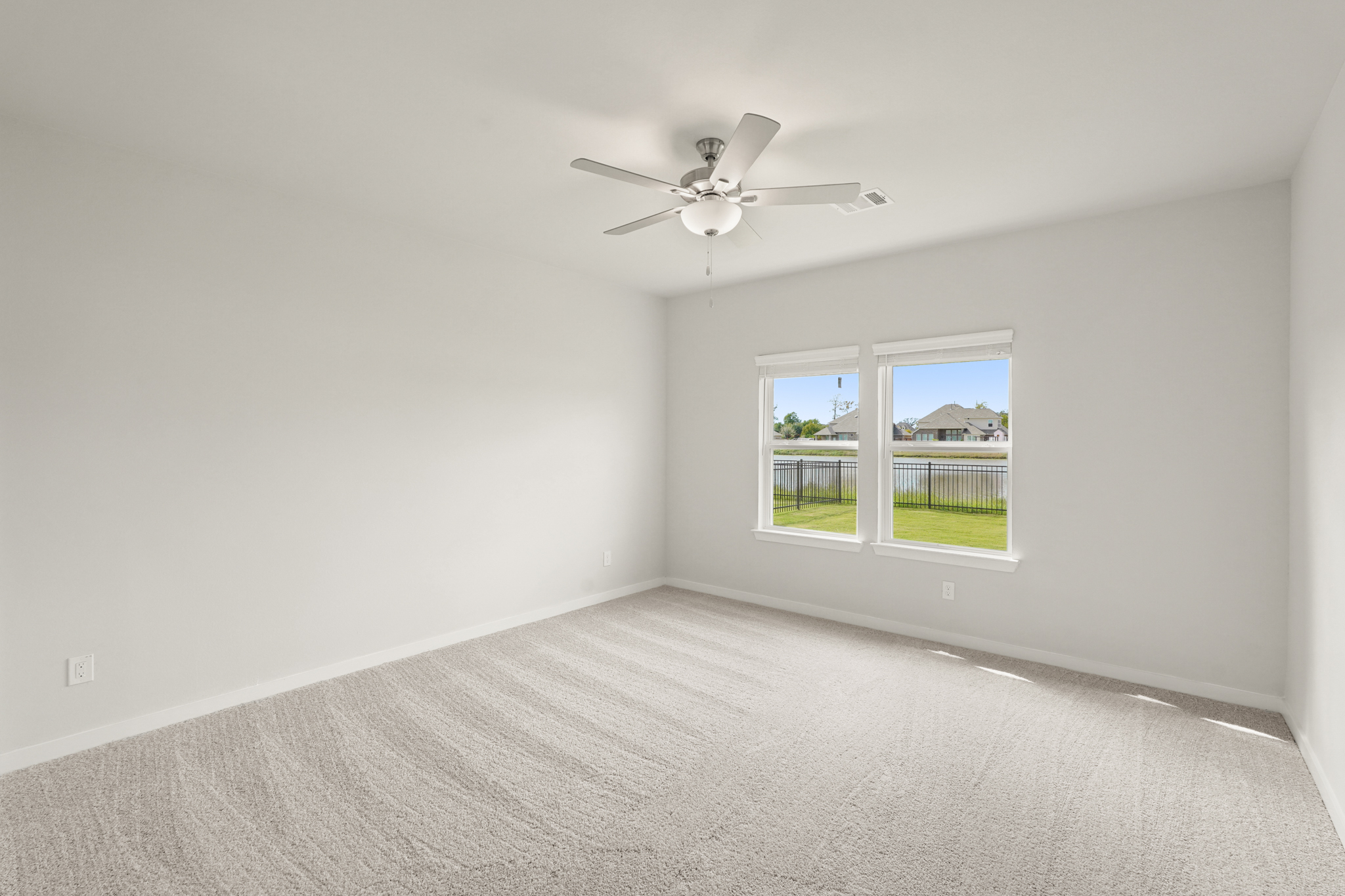 A ceiling fan in a room.