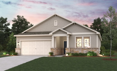 A house with a lawn in front of it.