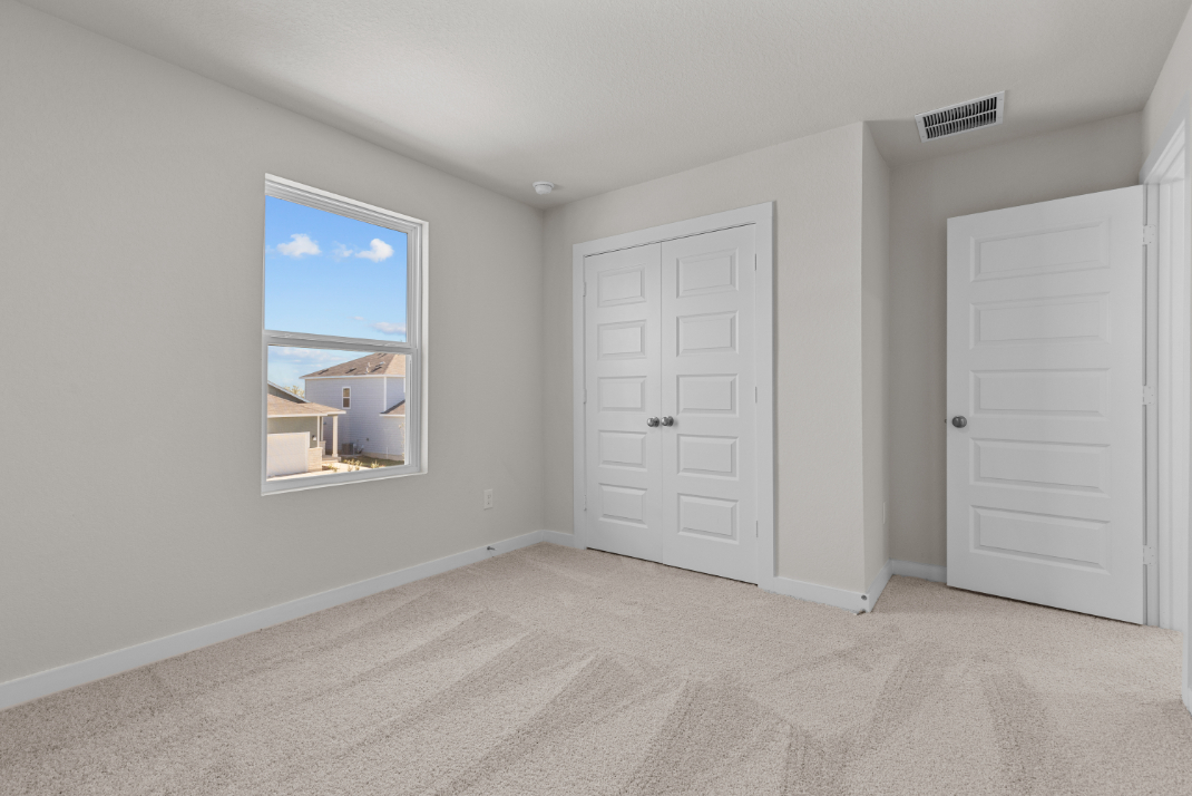 A room with white doors.