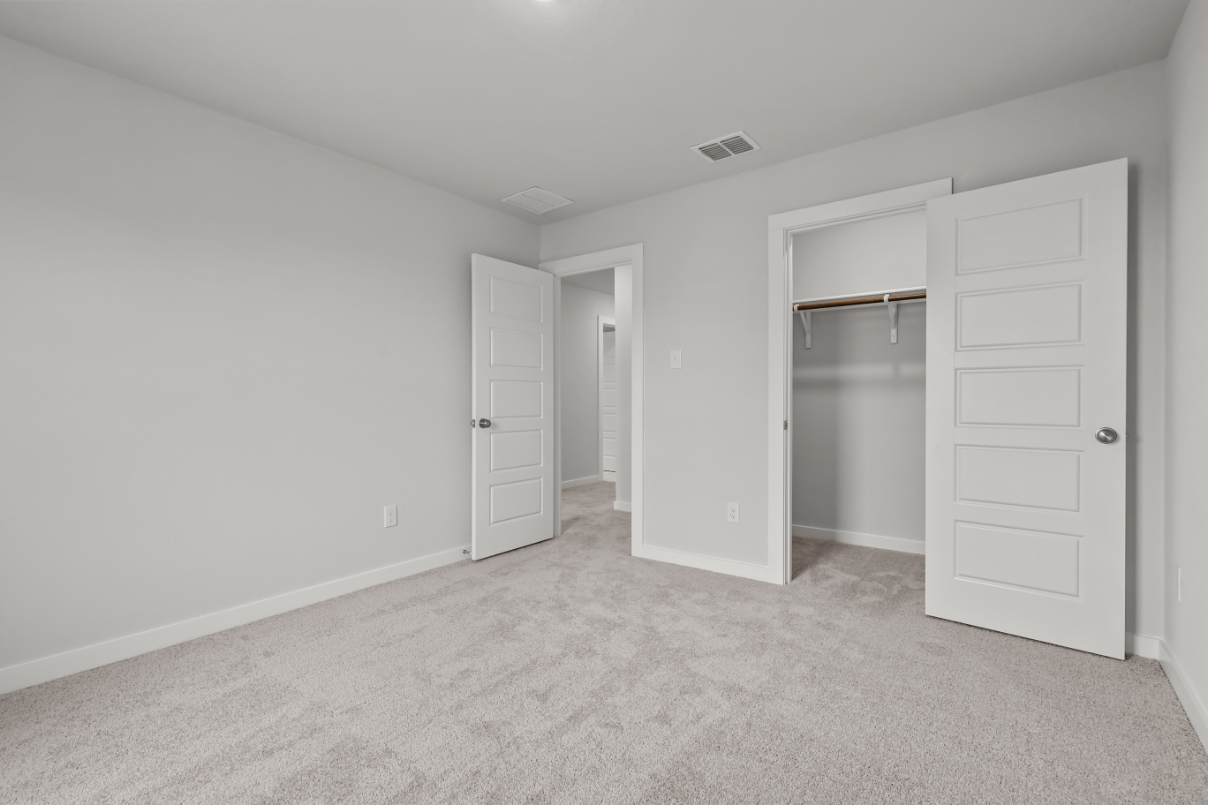 A room with white doors.