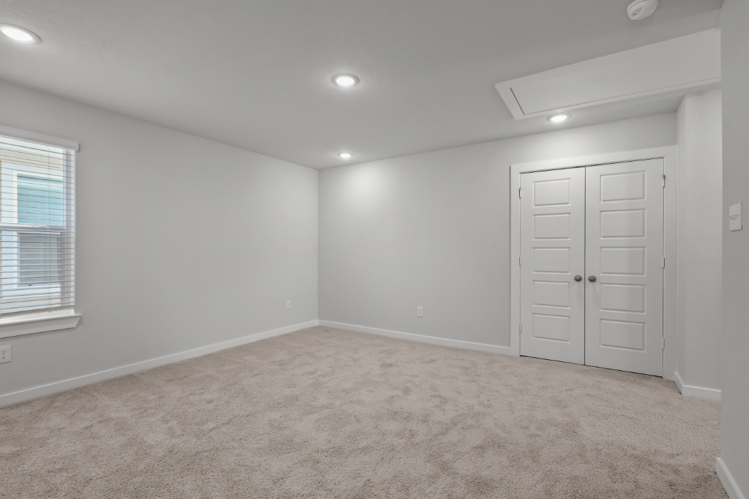 A room with white doors.
