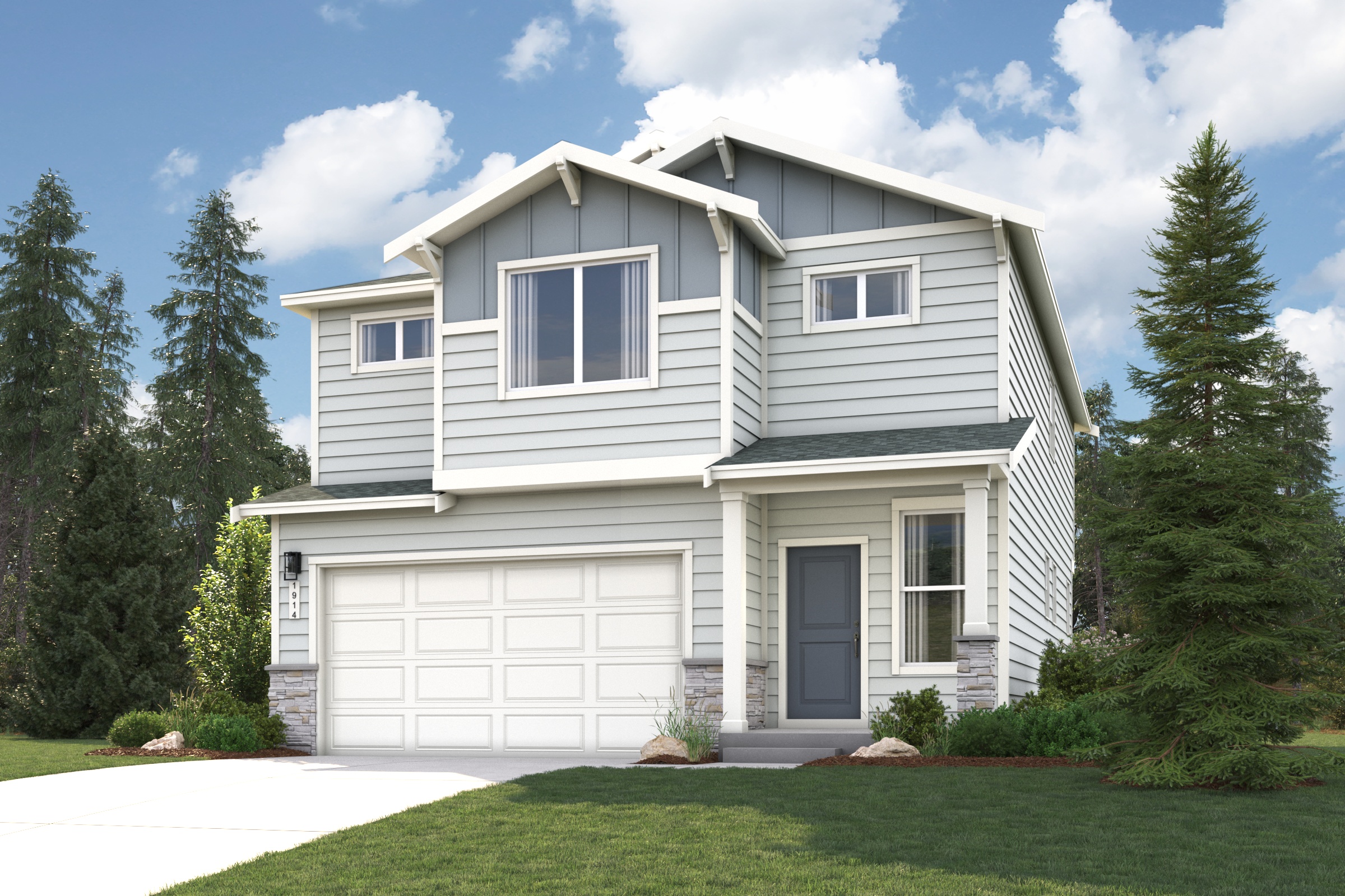 A house with a garage and trees around it.