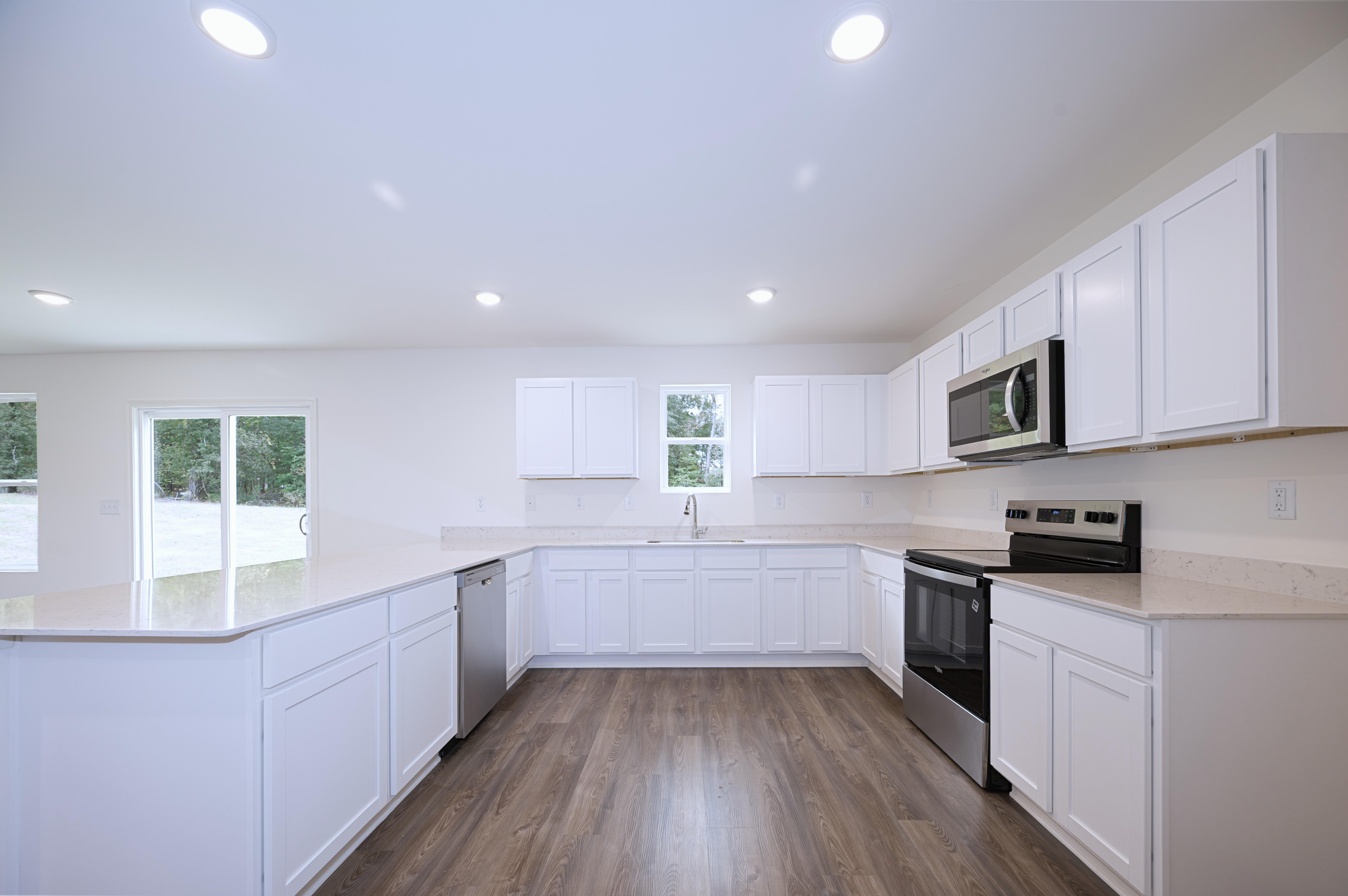 kitchen 2 - amberwood - unfurnished + quartz - se arrowhead by the lake