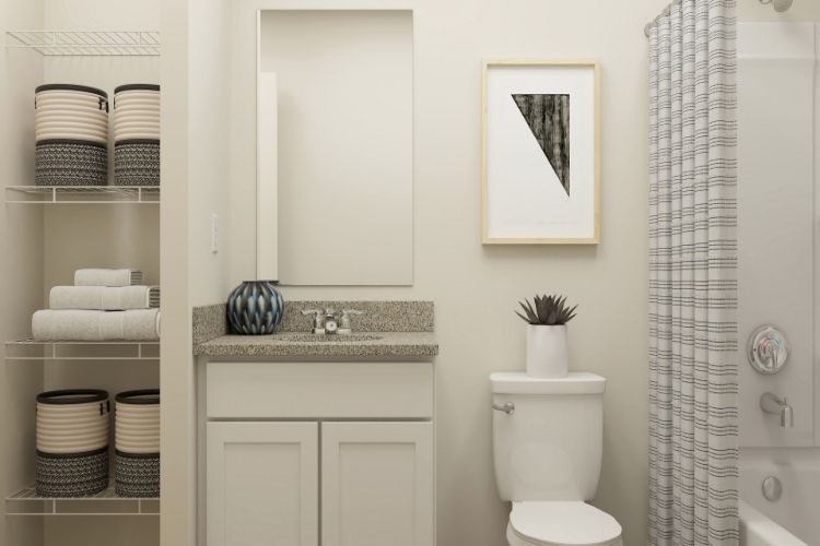 A bathroom with a toilet and a sink.