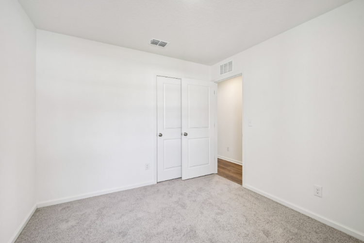 A room with white doors.