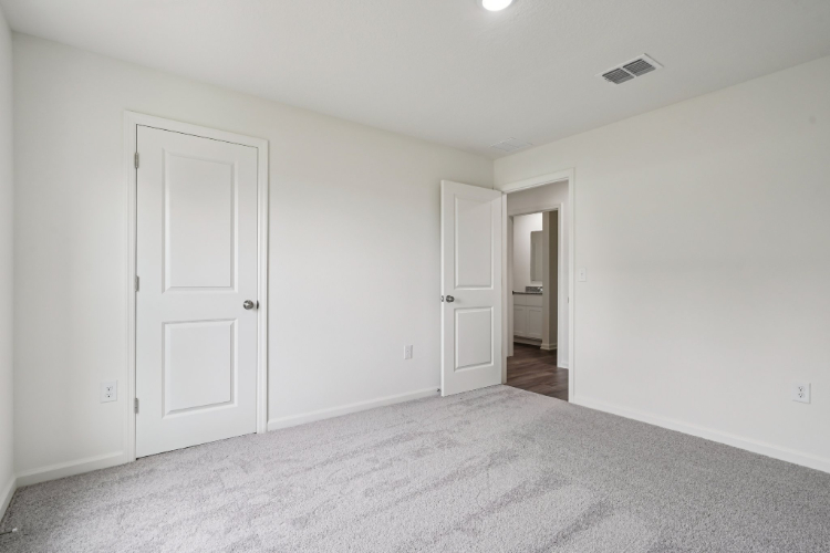 A room with white doors.