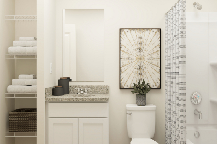 A bathroom with a toilet and a sink.